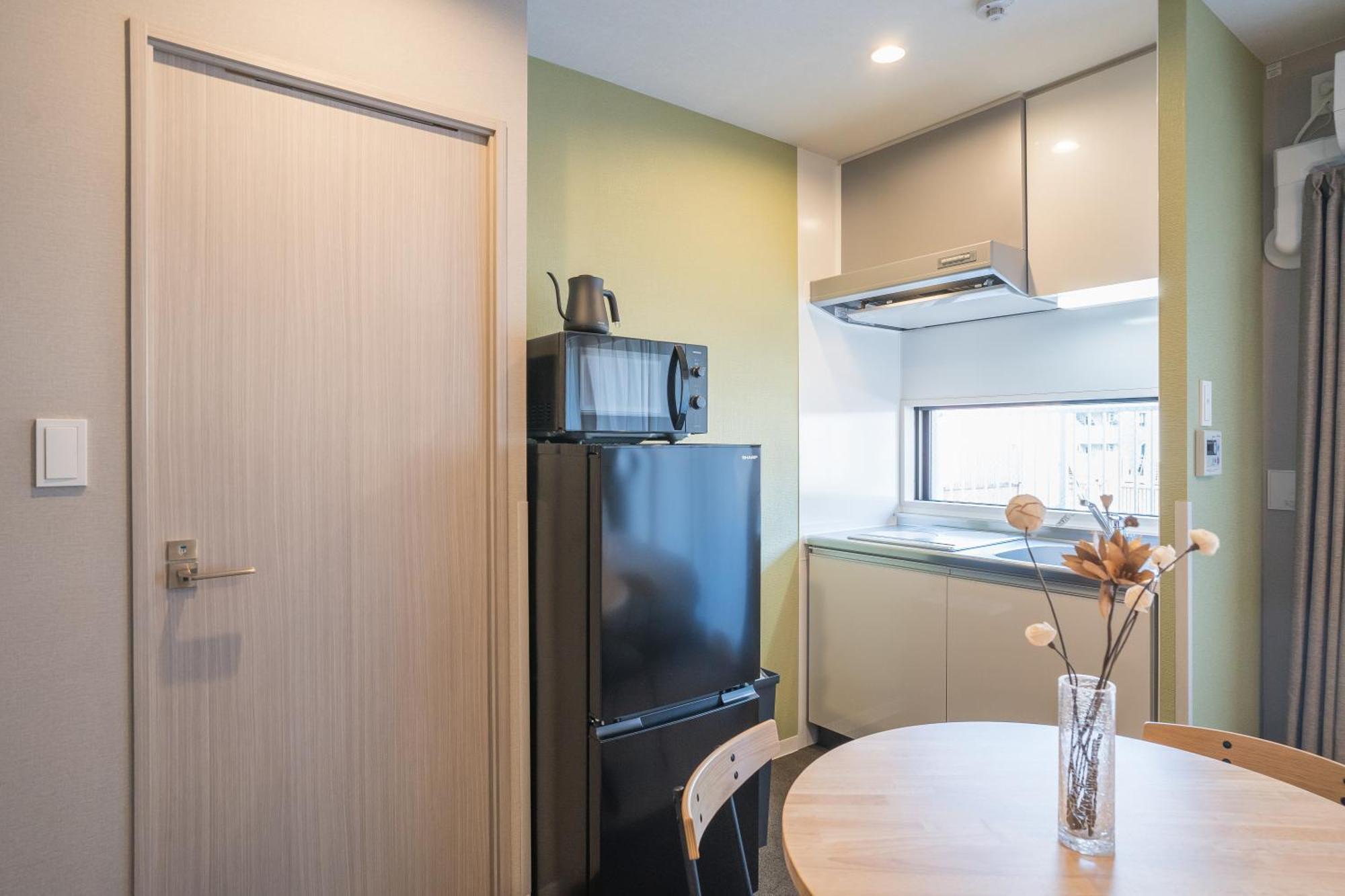 Apartment Hotel 11 Umeda Kamiyama Ósaka Pokoj fotografie